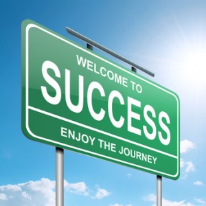 Highway sign saying welcome to success